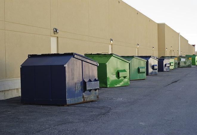 a row of industrial dumpsters at a construction site in Bonsall, CA